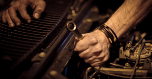 Fibreglass Garage Roof, Mechanic working on a Car